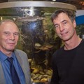 Bemühen sich als gemeinsam um den Huchen (im Hintergrund) und damit um das Ökosystem Fluss: Fischereifachberater Dr. Oliver Born und Filmemacher Florian Guthknecht.